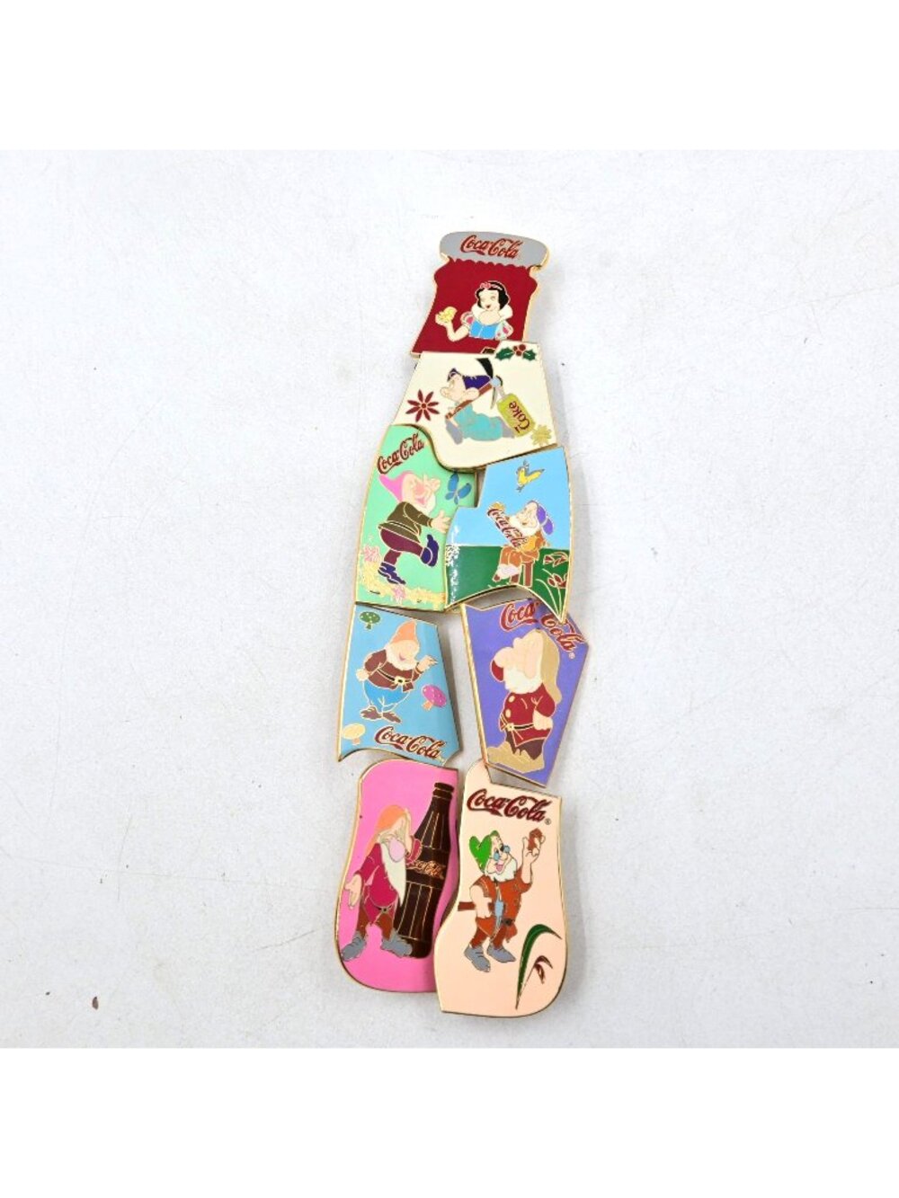 Coca Cola Snow White and the Seven Dwarfs Bottle Puzzle 8 Fantasy Pin Set